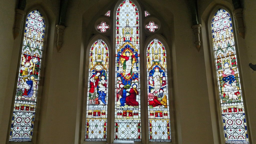 A stained glass window at the front of St Mary's Rawmarsh church